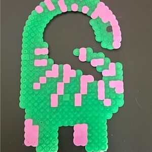Perler bead dinosaur magnet